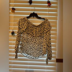 Strapless top, long sleeve. Size Medium. Worn only once.